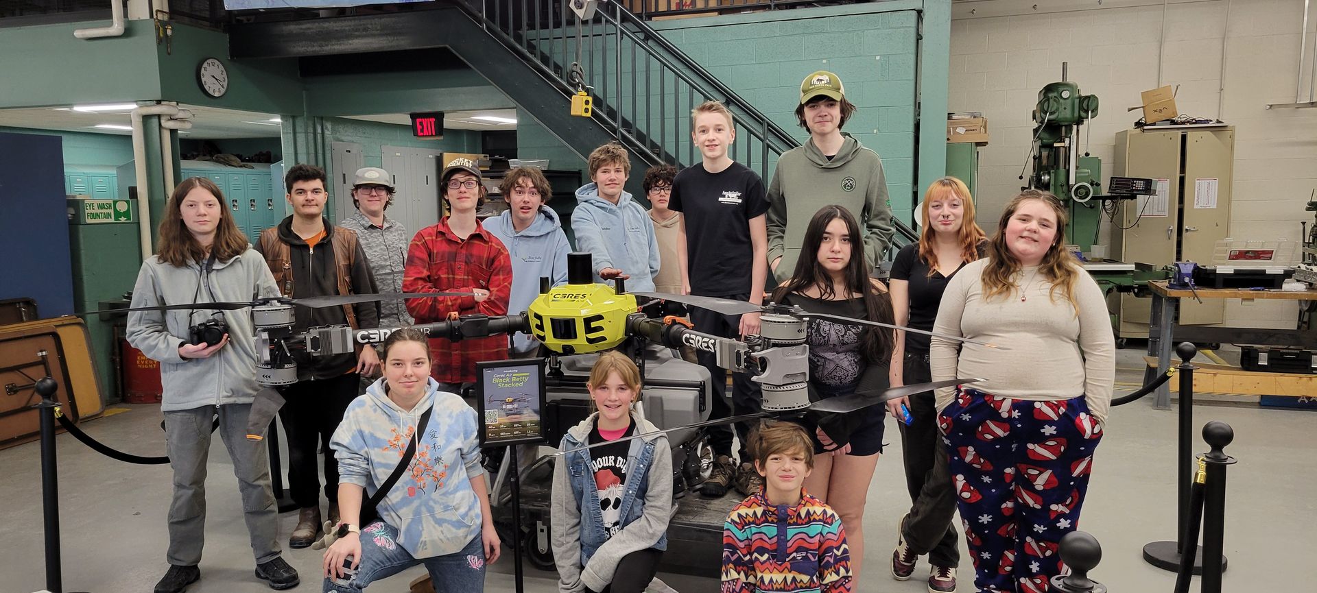Middle and high school robotics students piloting drones at River Valley Technical Center during a Ceres Air demonstration